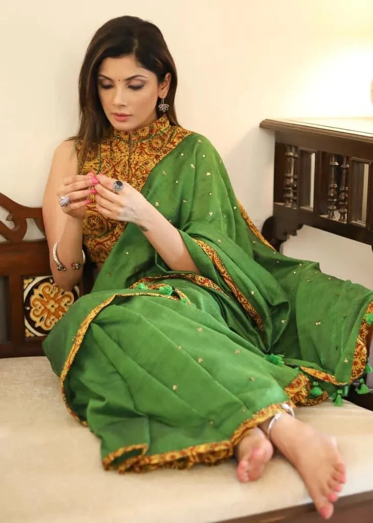 GREEN COTTON SAREE WITH YELLOW AJRAKH BORDER AND GOLDEN EMBELLISHMENT