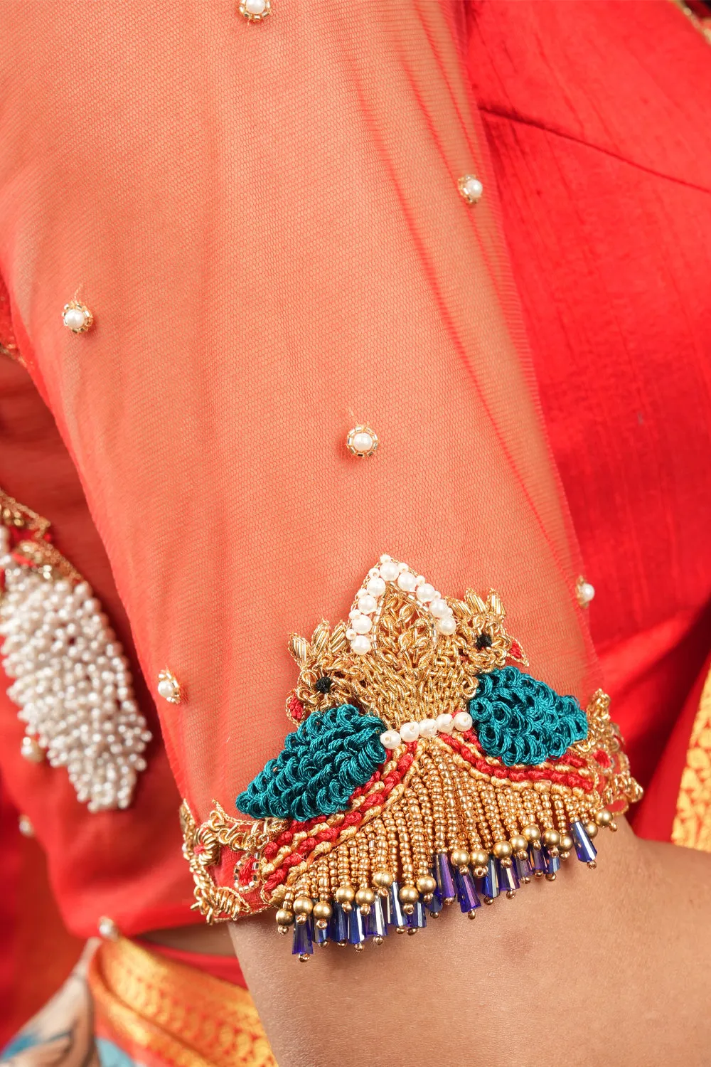 Red Pure raw silk and net peacock design handwork blouse with sheer back sleeves